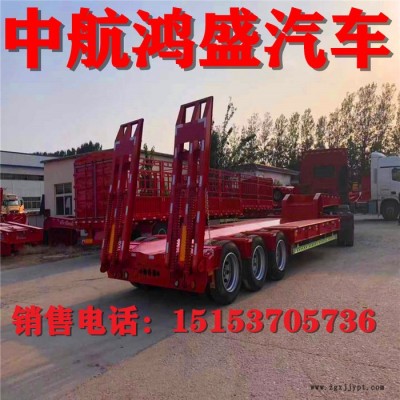 高配置液壓勾機(jī)板半掛車 13米半掛車三線六軸低平板半掛車 輪胎外漏式半掛車價格